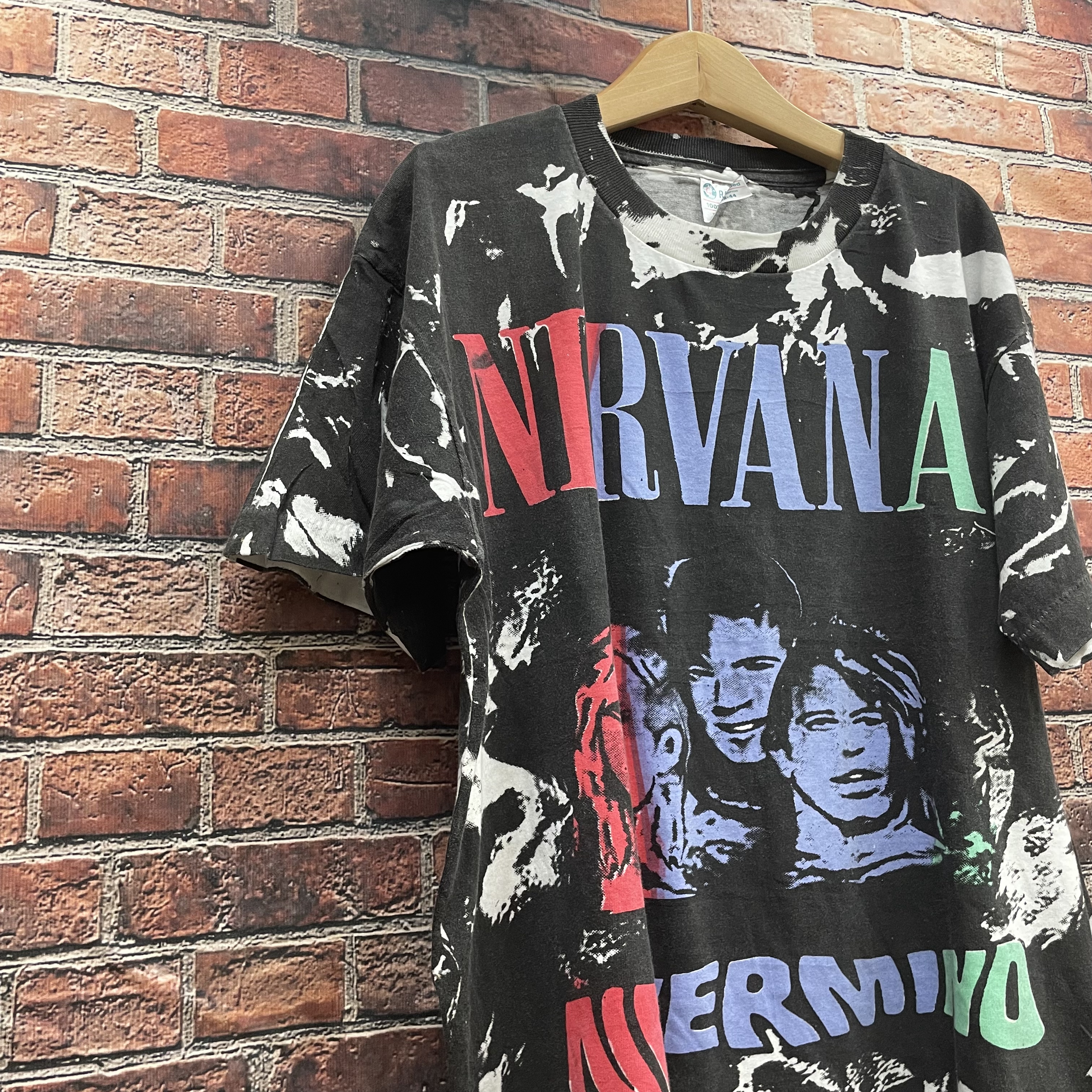 首相発言を評価 Nirvana vintage Tシャツ 総柄 - uinsa.ac.id